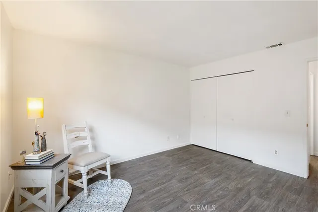 a workspace with furniture and wooden floor