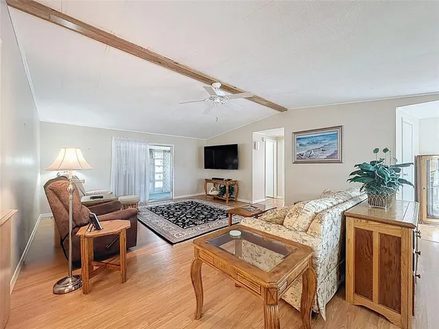 a living room with furniture and a couch