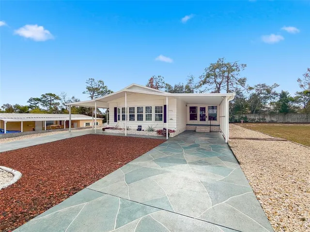 a house view with a outdoor space