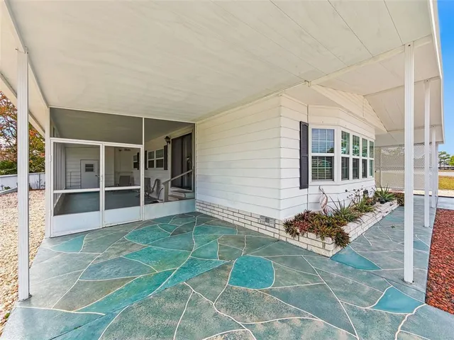 a view of a house with a lounge chair