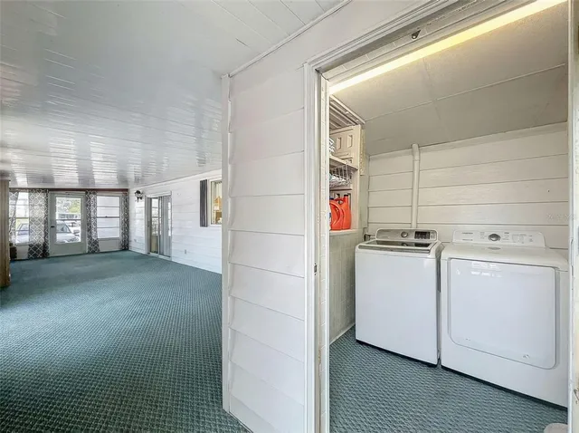 a view of balcony with furniture