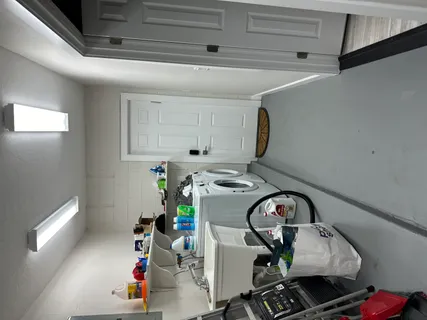 a room with storage and utility