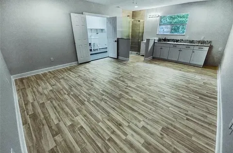 a view of a kitchen with a sink