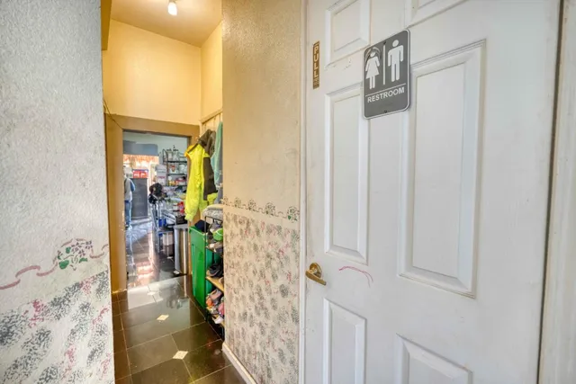 a room with furniture and a chandelier