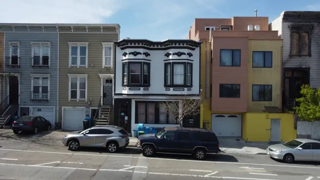 a car parked in front of a building