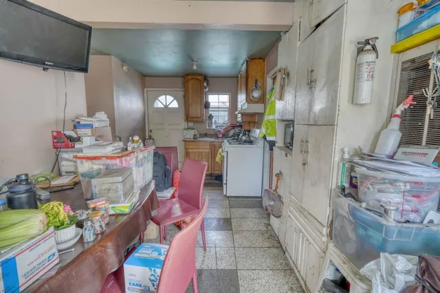a bathroom with a sink toilet and a mirror