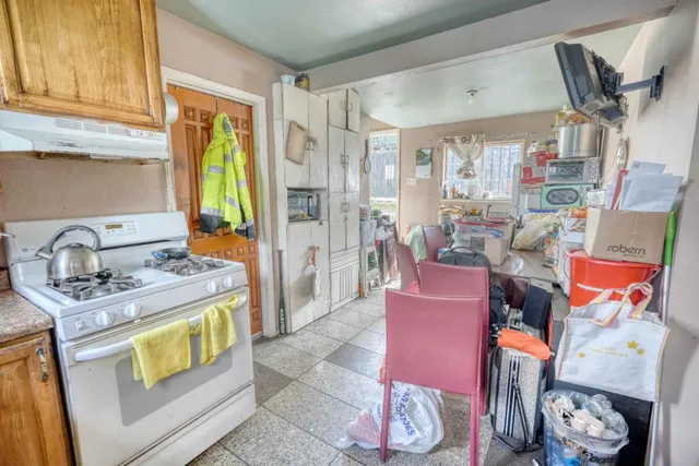 view of front door of house with potted plant