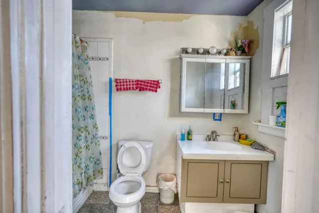 a view of a street with sitting area