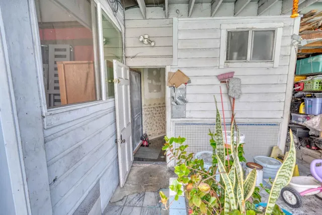 a view of a chairs and tables in the patio