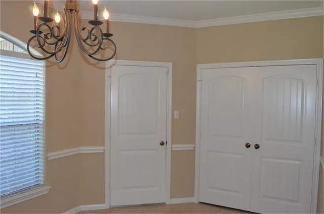 a view of a room with racks on the wall