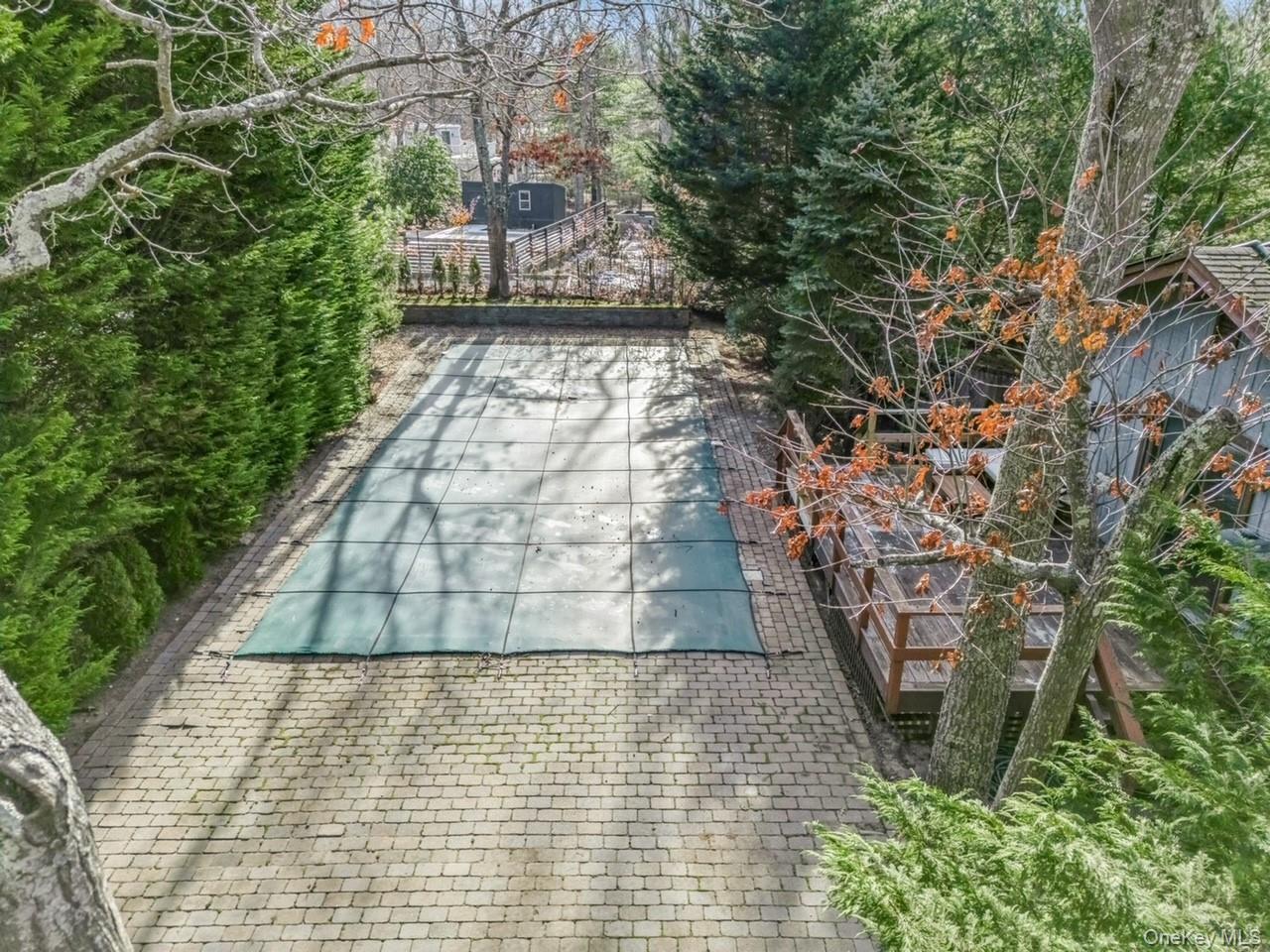 292 Little Fresh Pond Road Southampton, NY 11968 - Photo 39 of 46 Heated Lap Pool With Spacious Patio