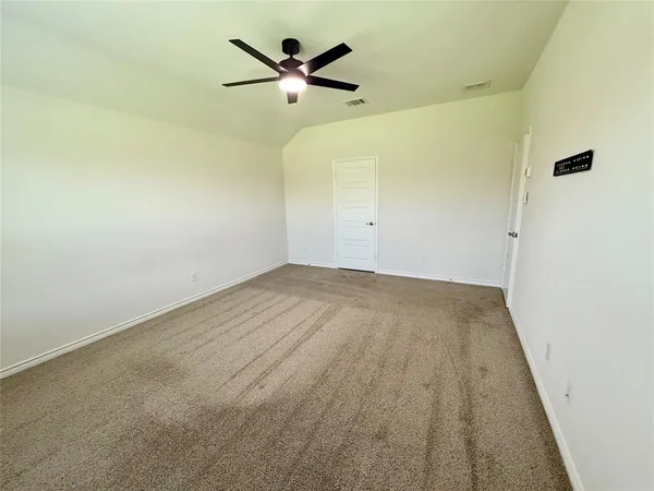 a view of a big room with wooden floor