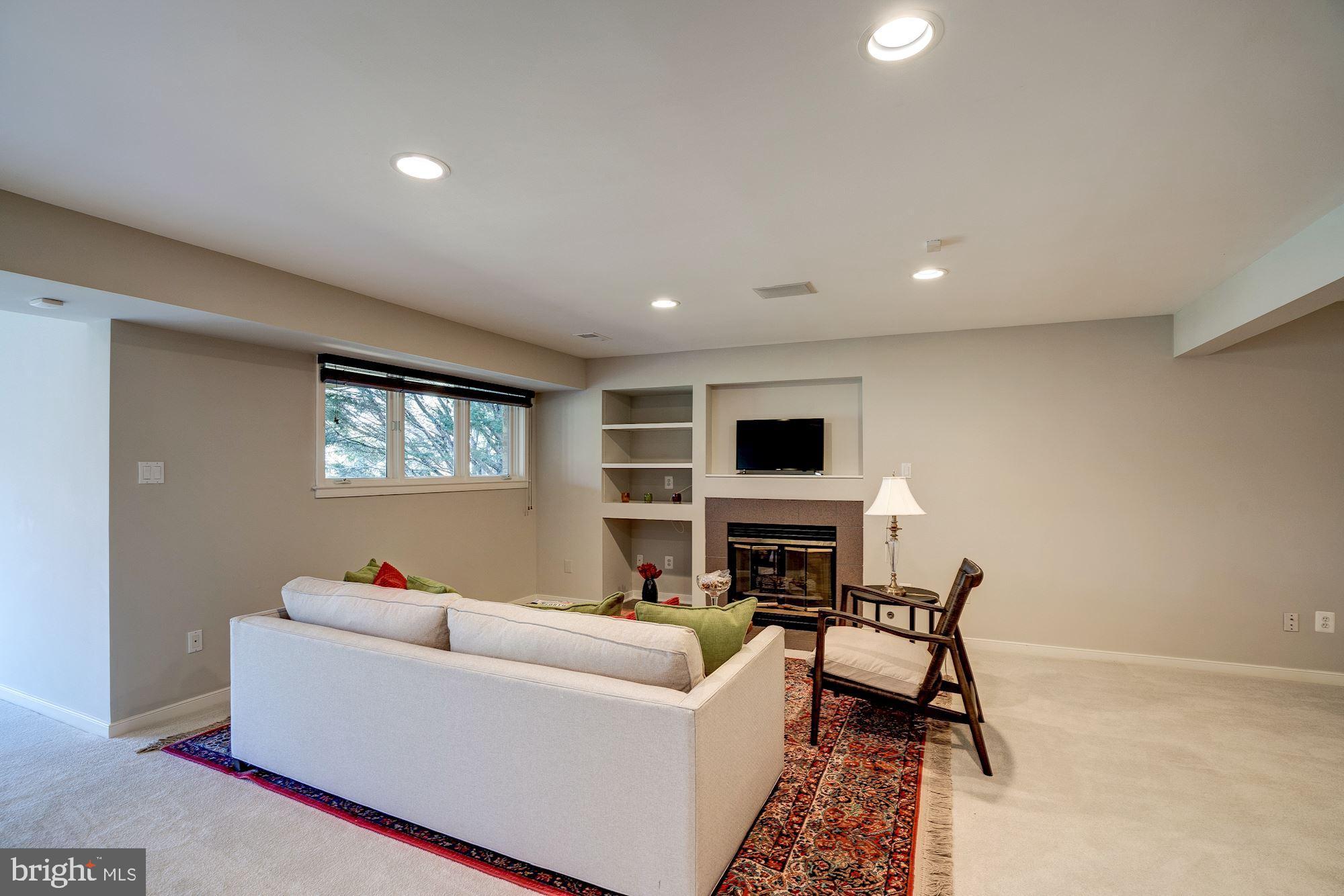1466 Waterfront Road Reston, VA 20194 - Photo 34 of 69 Lower level rec room with fireplace