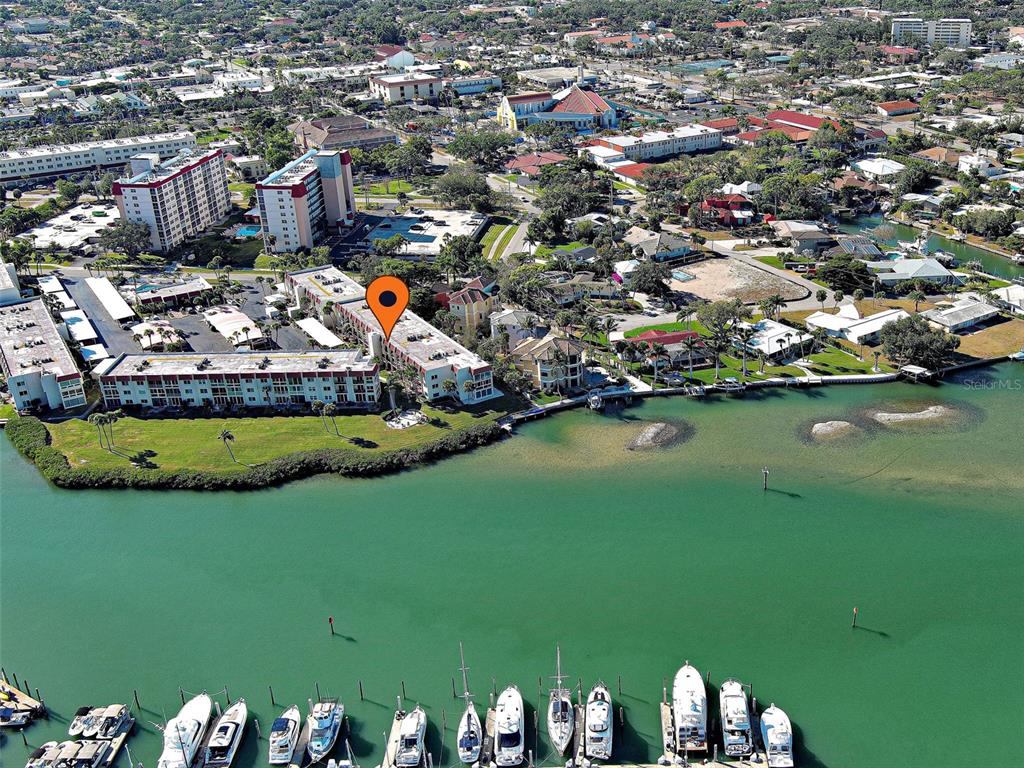260 Santa Maria Street, Unit 109 Venice, FL 34285 - Photo 16 of 64 an aerial view of a house with a swimming pool yard and outdoor seating