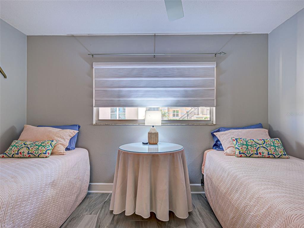 260 Santa Maria Street, Unit 109 Venice, FL 34285 - Photo 36 of 64 a bedroom with a bed and a window