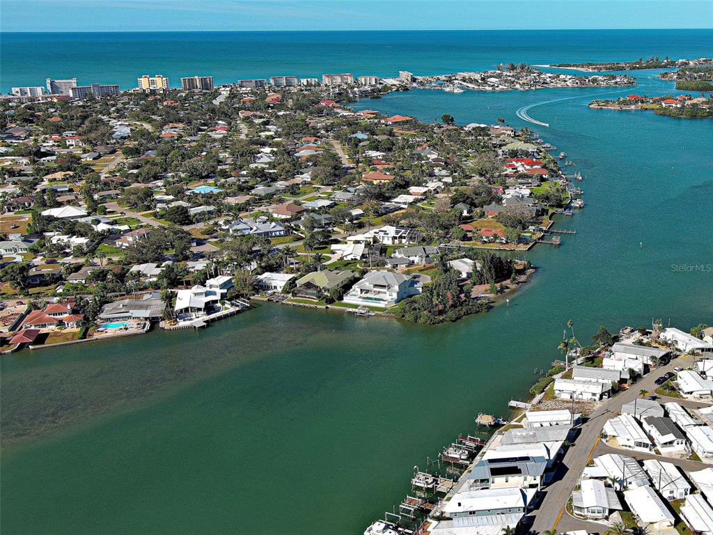 260 Santa Maria Street, Unit 109 Venice, FL 34285 - Photo 48 of 64 an aerial view of a house with a lake view