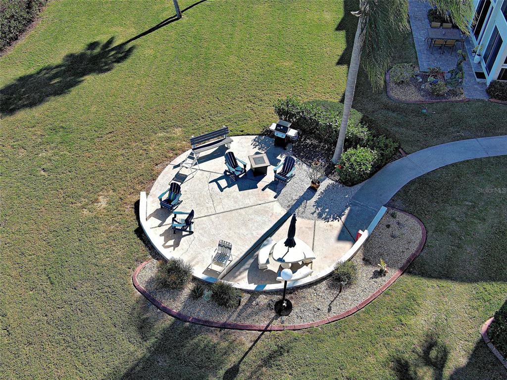 260 Santa Maria Street, Unit 109 Venice, FL 34285 - Photo 57 of 64 an aerial view of a house with a yard