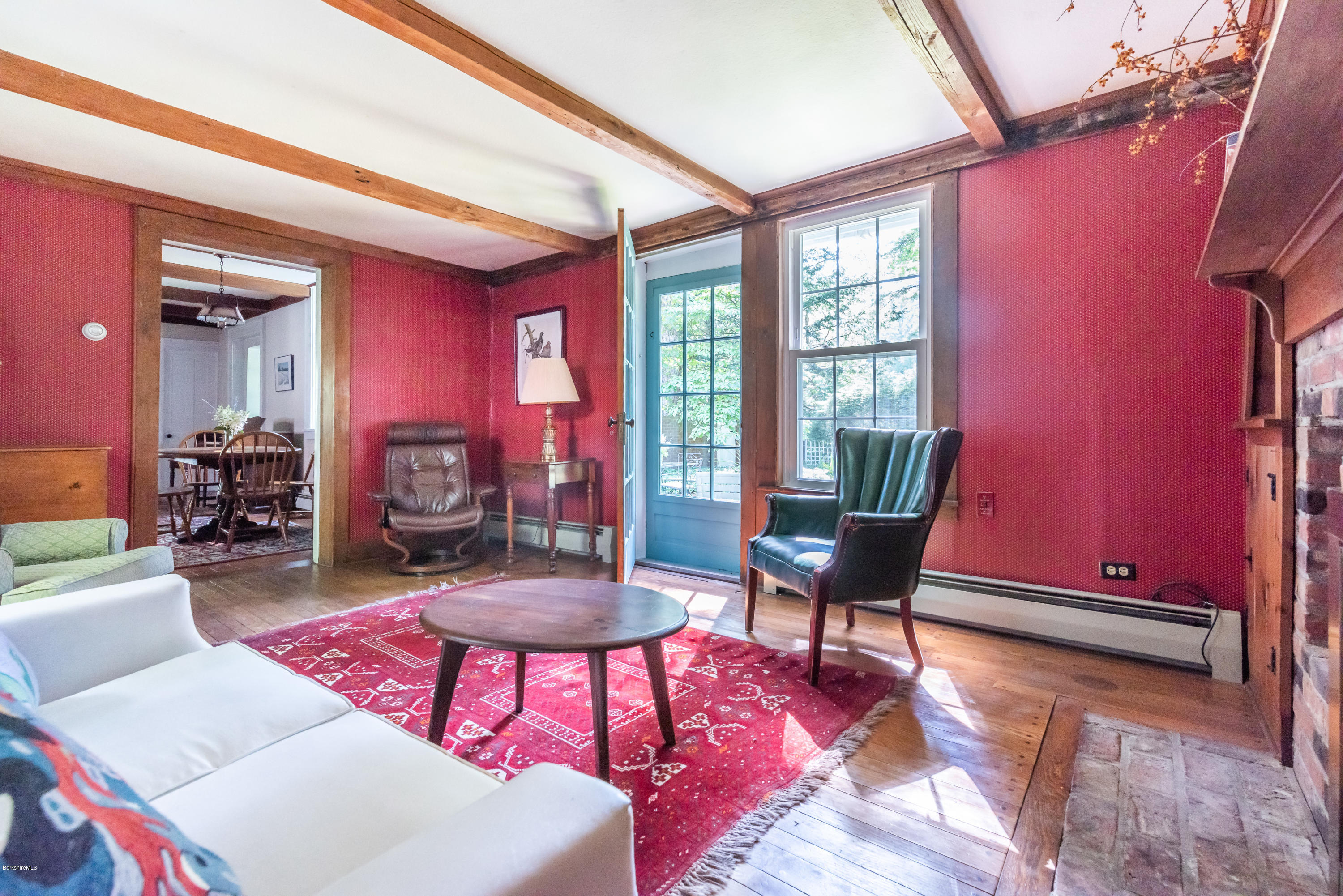 2 Christian Hill Road Stockbridge, MA 01229 - Photo 13 of 25 a living room with furniture a rug potted plant and a large window