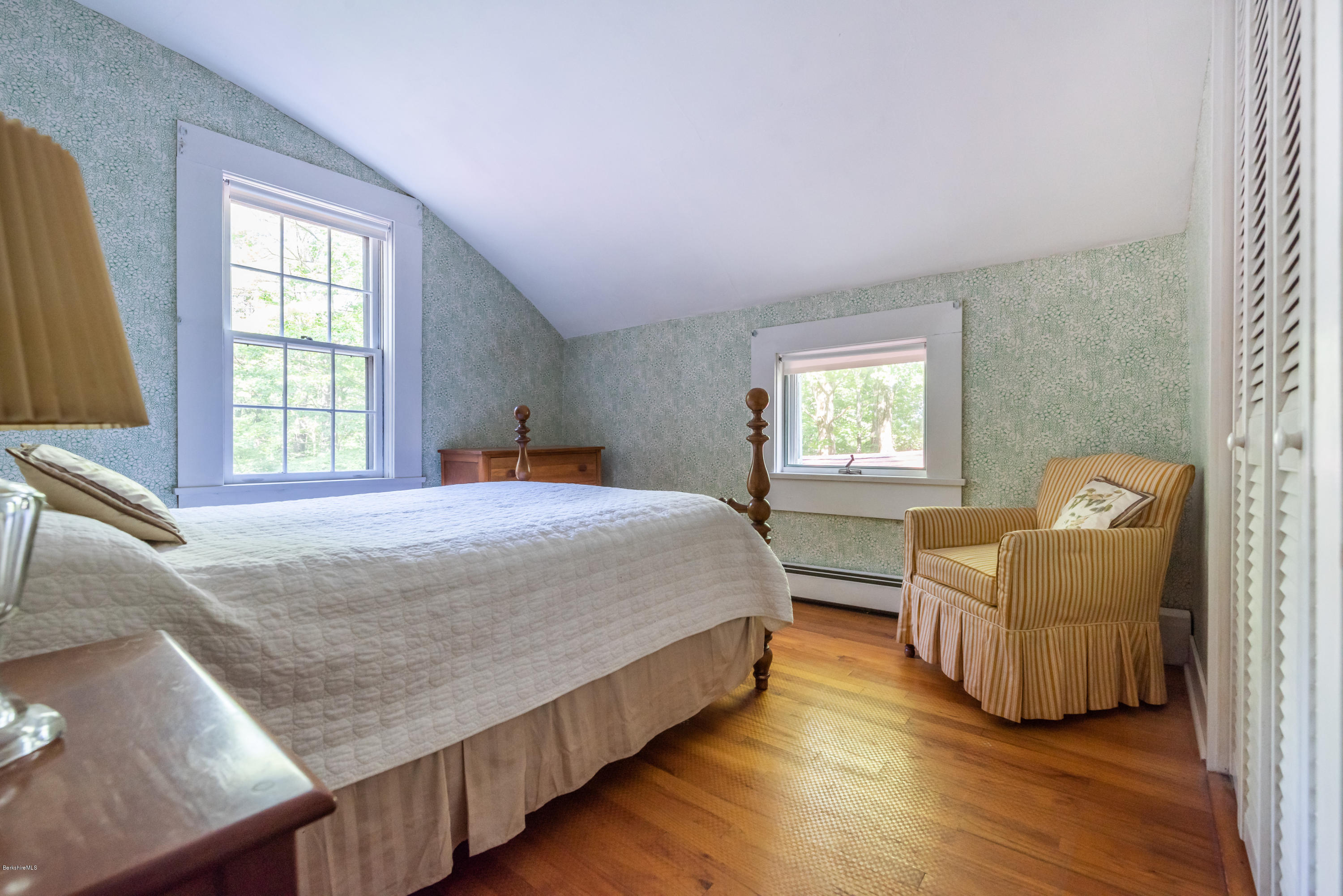 2 Christian Hill Road Stockbridge, MA 01229 - Photo 17 of 25 a spacious bedroom with a bed and window