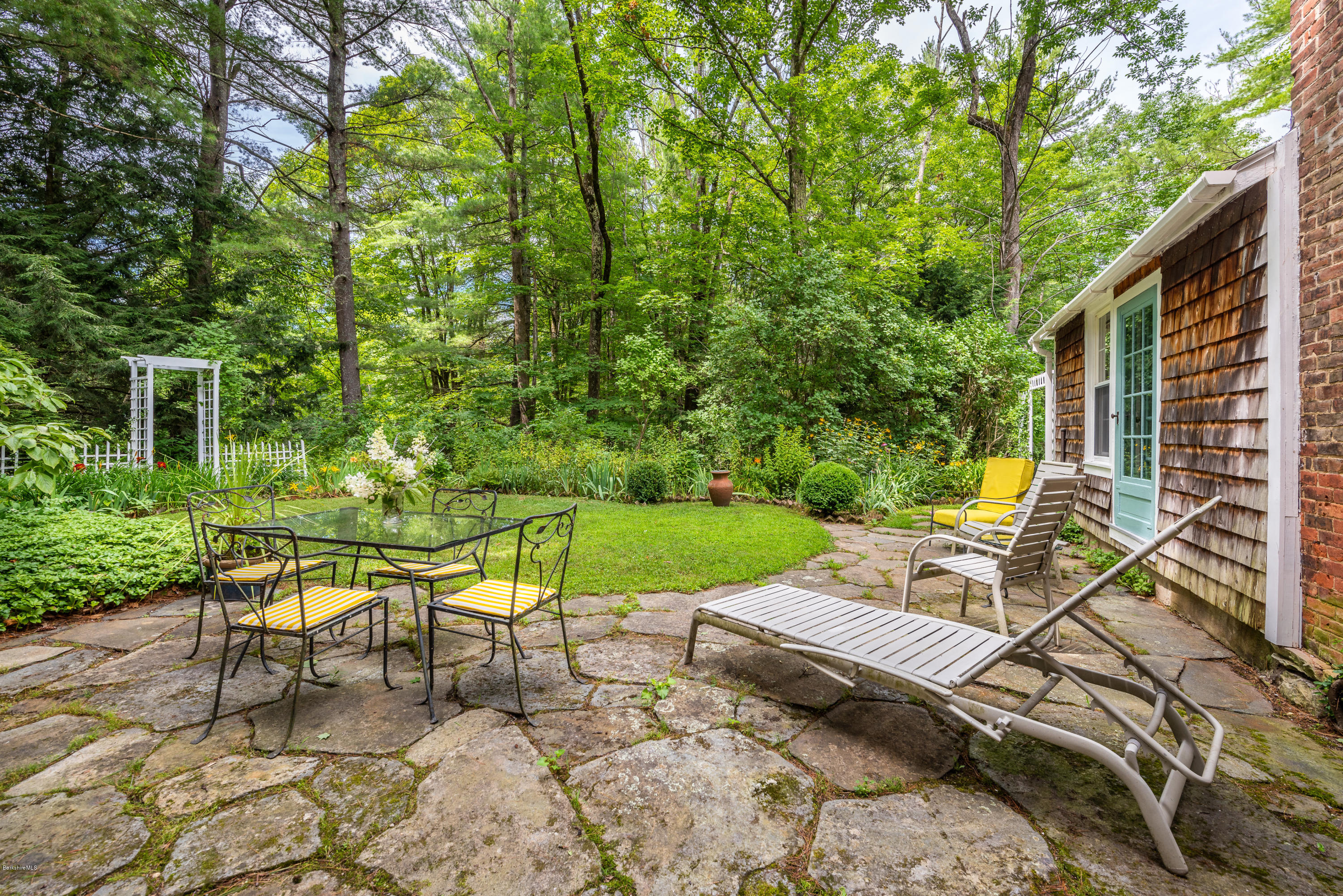 2 Christian Hill Road Stockbridge, MA 01229 - Photo 23 of 25 a view of a patio with a yard