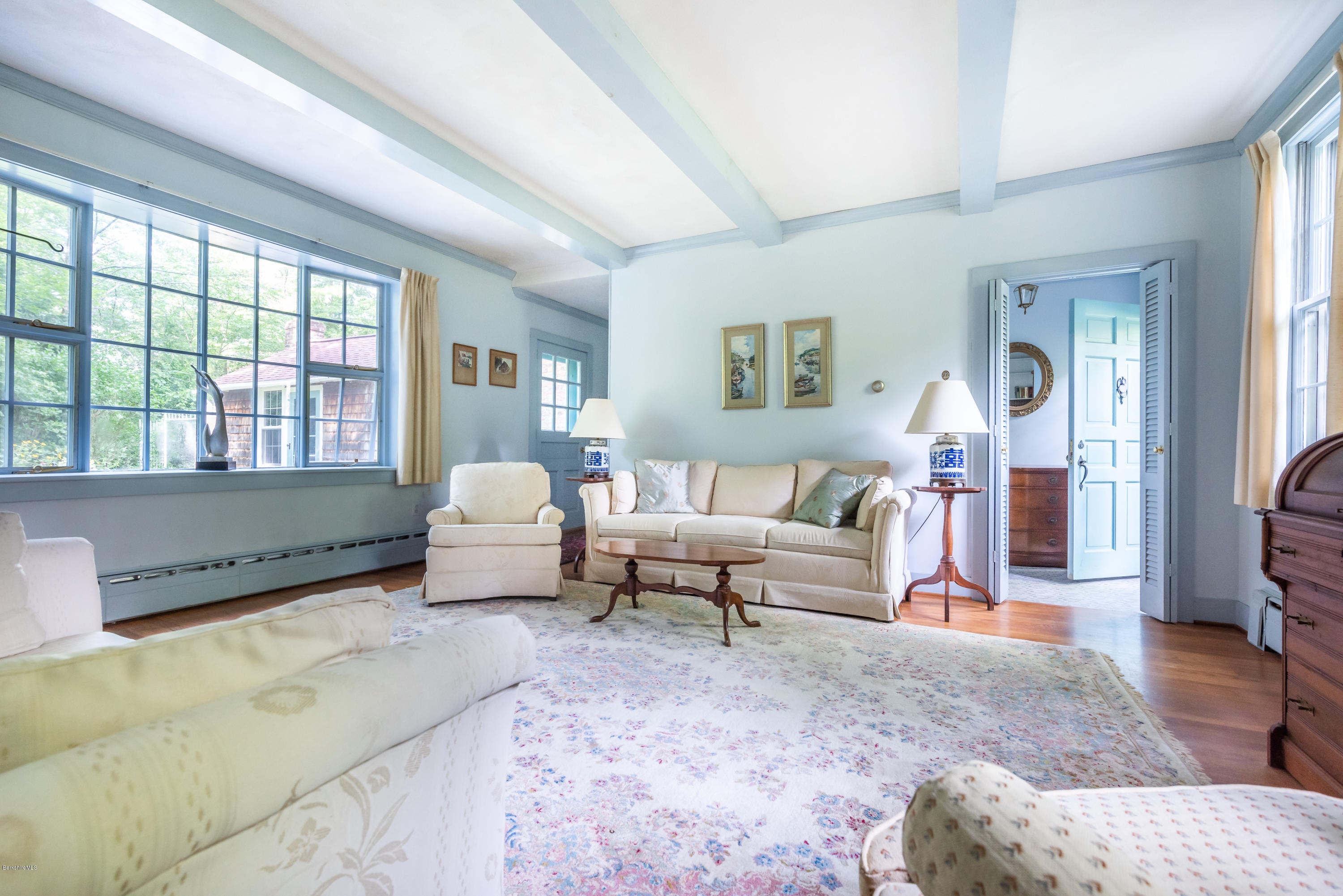 2 Christian Hill Road Stockbridge, MA 01229 - Photo 5 of 25 a living room with furniture and a large window