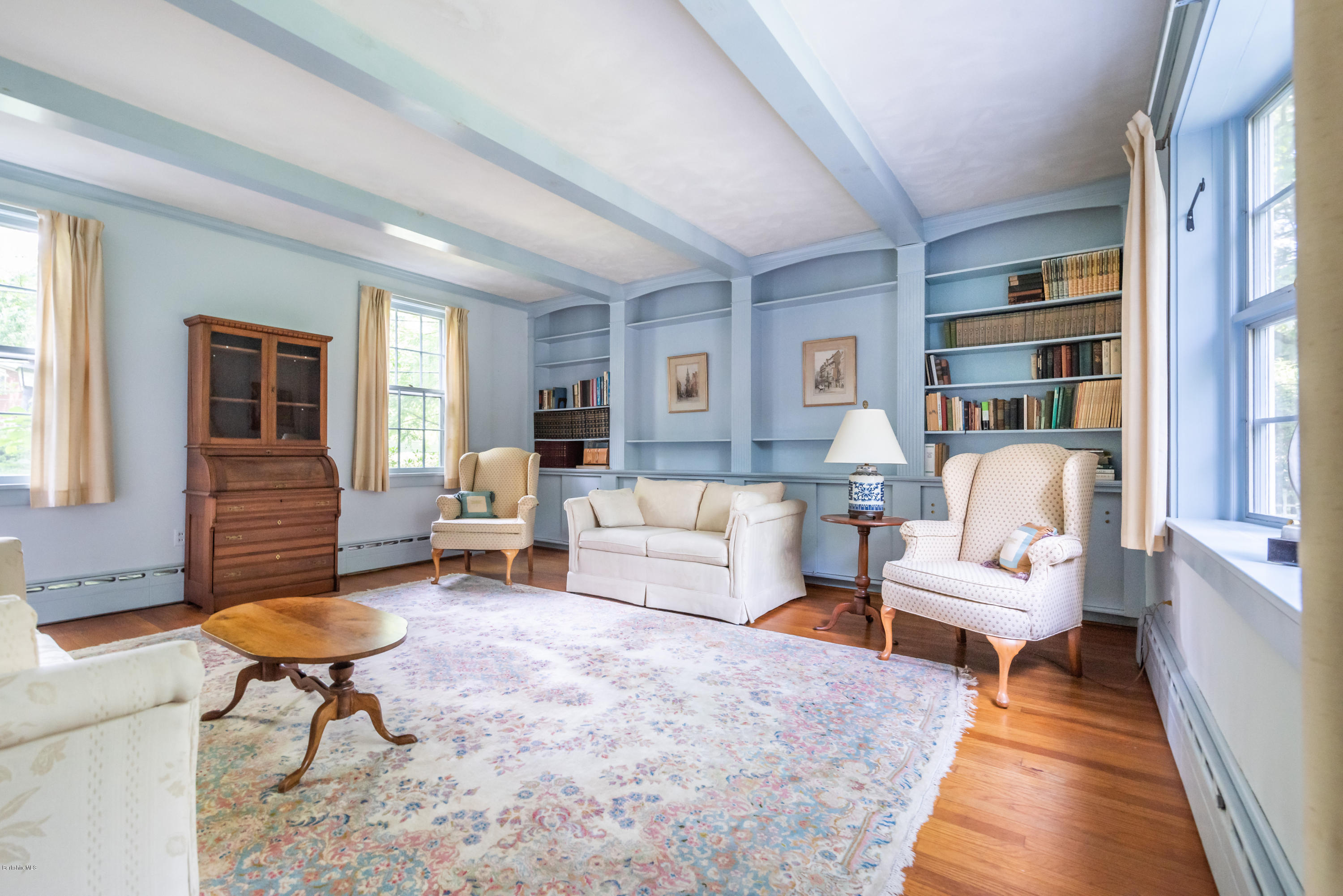 2 Christian Hill Road Stockbridge, MA 01229 - Photo 6 of 25 a living room with furniture a rug and a table