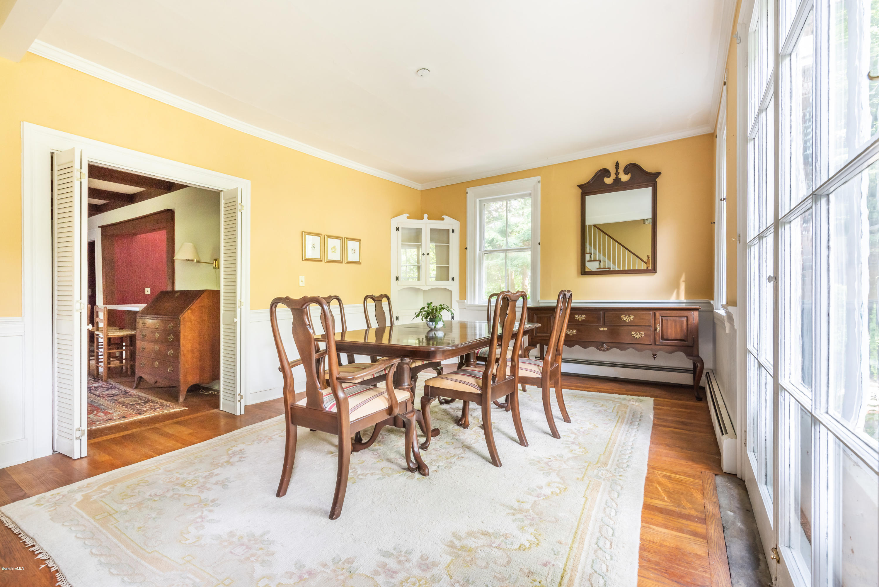 2 Christian Hill Road Stockbridge, MA 01229 - Photo 8 of 25 a view of a dining room with furniture and a window