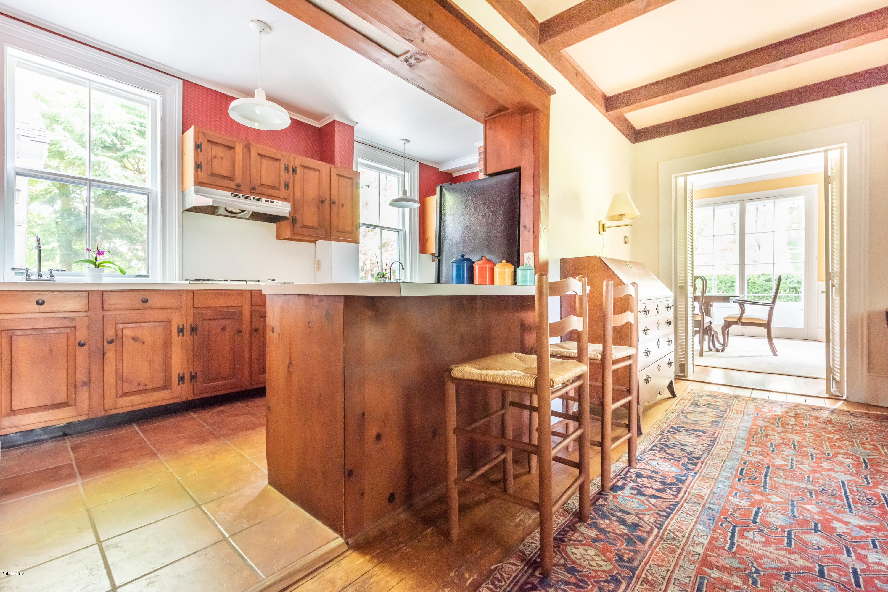 2 Christian Hill Road Stockbridge, MA 01229 - Photo 10 of 25 a dining hall with stainless steel appliances a table and chairs in it