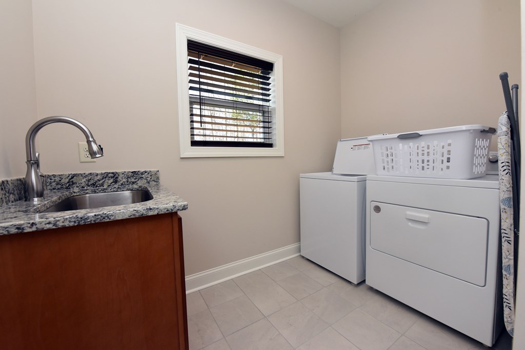 1008 Ridge Drive Morganton, GA 30560 - Photo 27 of 54 a view of storage and utility room with washer and dryer