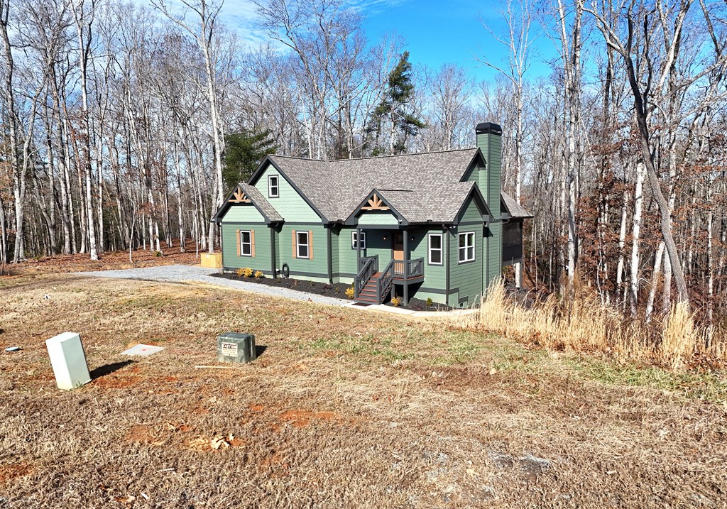 1008 Ridge Drive Morganton, GA 30560 - Photo 33 of 54 a view of a house with a yard