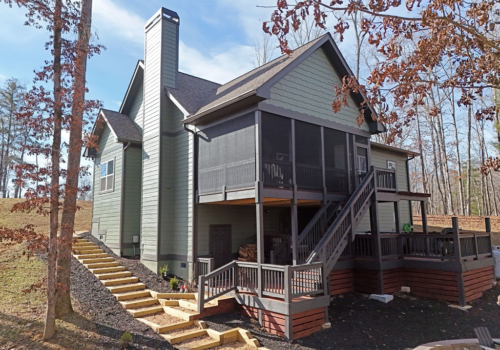 1008 Ridge Drive Morganton, GA 30560 - Photo 34 of 54 a front view of a house with entryway