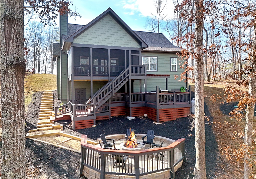 1008 Ridge Drive Morganton, GA 30560 - Photo 35 of 54 a view of a house with backyard and sitting area