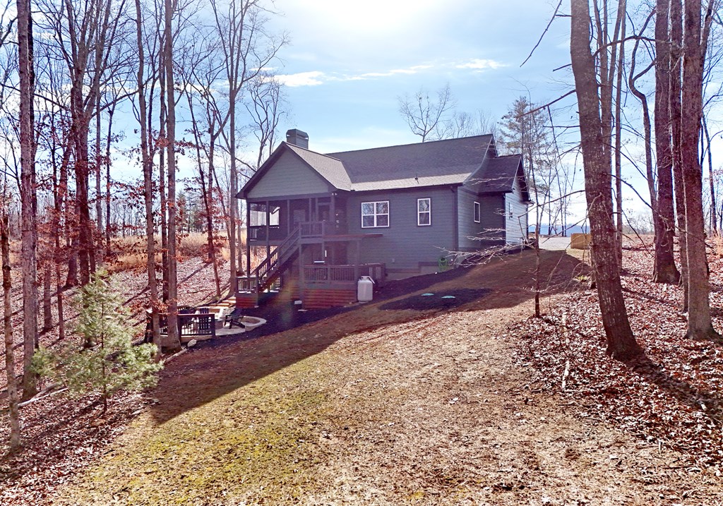 1008 Ridge Drive Morganton, GA 30560 - Photo 38 of 54 a view of a house with a yard covered with snow in the yard