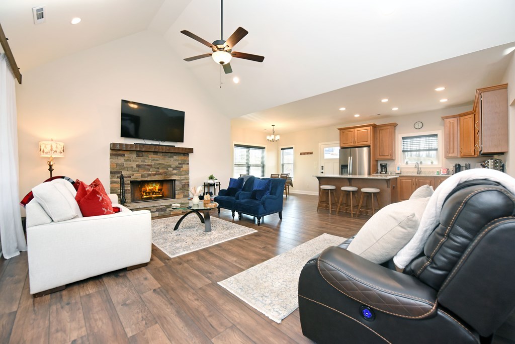 1008 Ridge Drive Morganton, GA 30560 - Photo 8 of 54 a living room with furniture and a flat screen tv