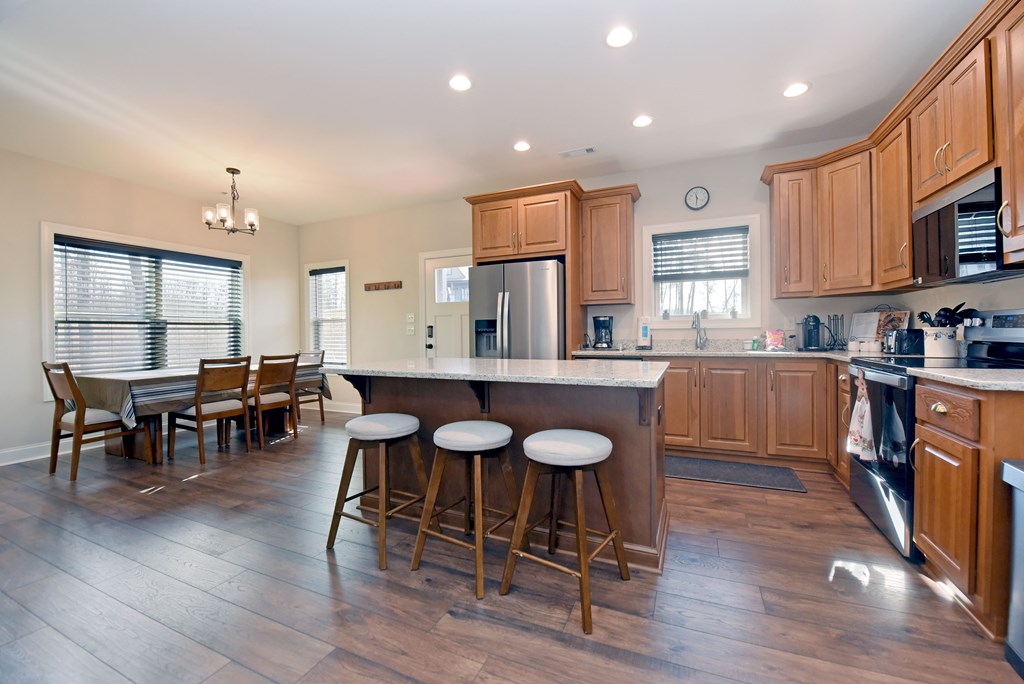 1008 Ridge Drive Morganton, GA 30560 - Photo 9 of 54 a large kitchen with a table and chairs