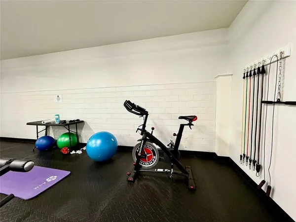 a view of a room with gym equipment