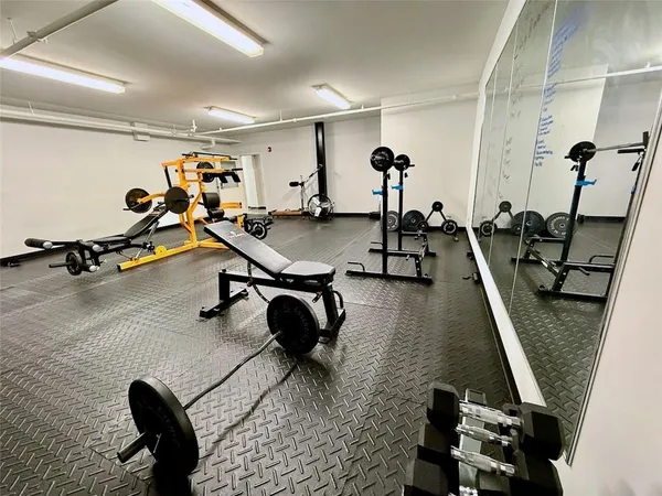 a view of a room with gym equipment