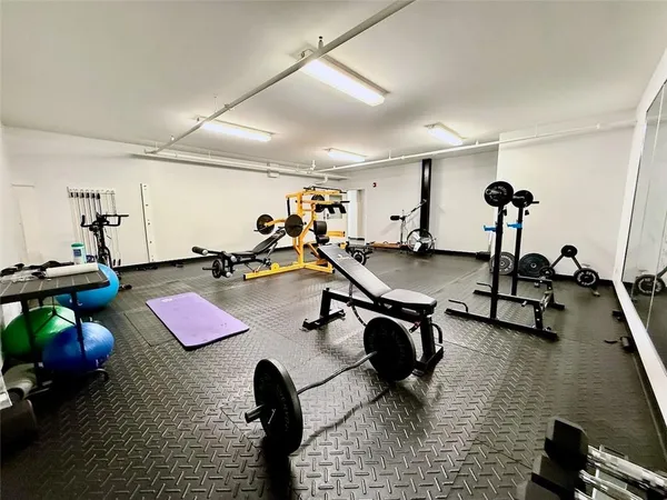 a view of a room with gym equipment