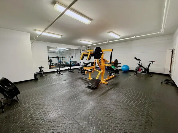a view of a room with gym equipment