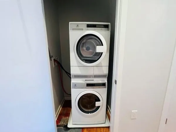 a utility room with dryer and washer