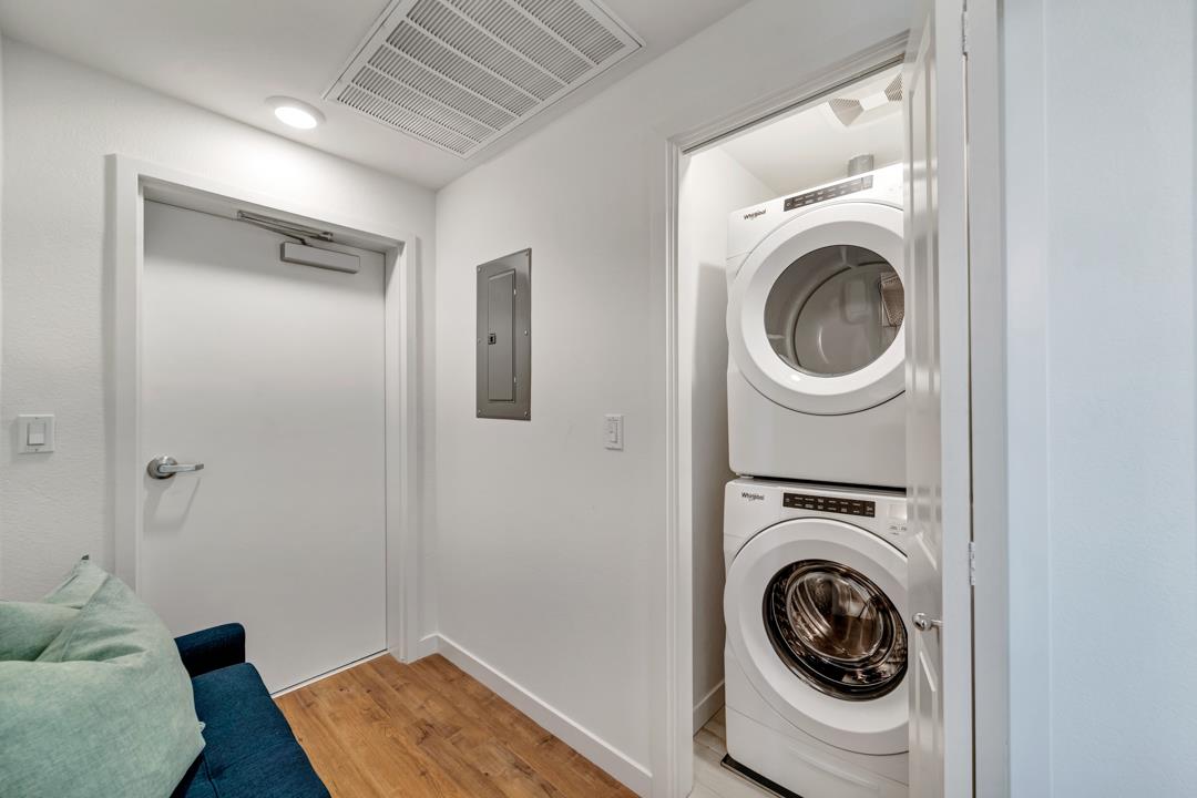 1421 Nightshade Road, Unit 40 Milpitas, CA 95035 - Photo 14 of 29 a view of a hallway with washer and dryer
