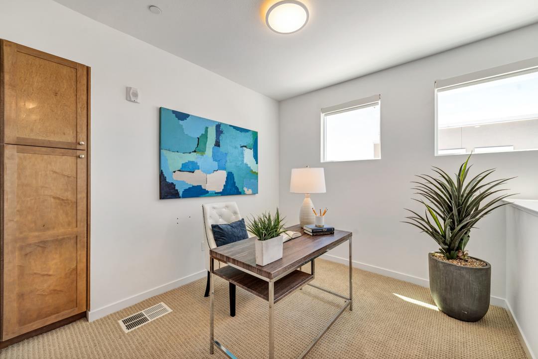 1421 Nightshade Road, Unit 40 Milpitas, CA 95035 - Photo 15 of 29 a living room with furniture and a potted plant