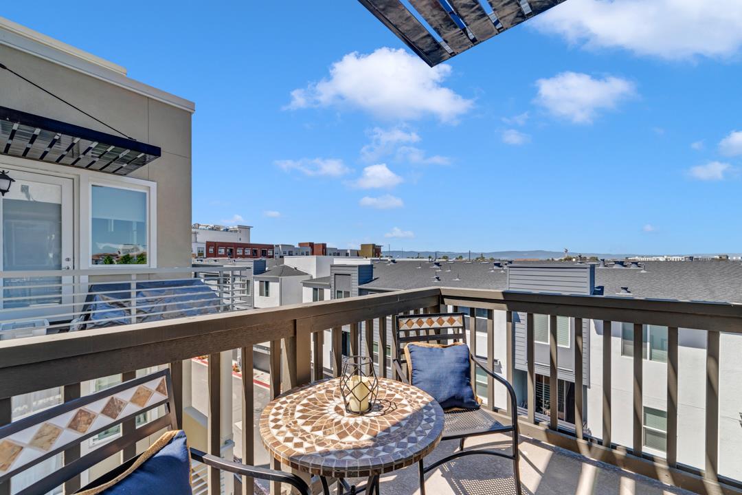 1421 Nightshade Road, Unit 40 Milpitas, CA 95035 - Photo 18 of 29 a view of a balcony with a lounge chair
