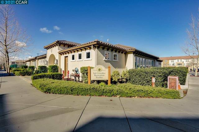 1421 Nightshade Road, Unit 40 Milpitas, CA 95035 - Photo 25 of 29 a front view of a house with a yard