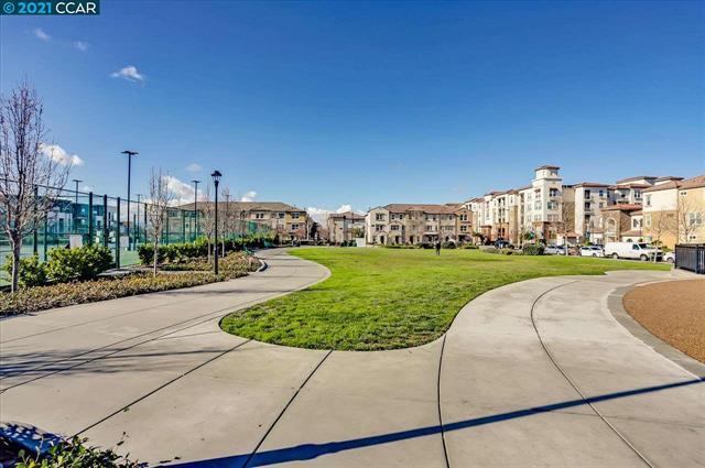 1421 Nightshade Road, Unit 40 Milpitas, CA 95035 - Photo 27 of 29 a view of a garden with tall buildings