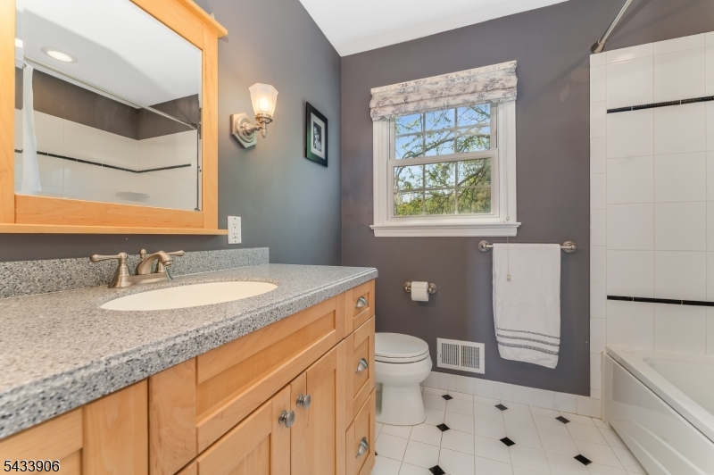 14 Lexington Road Annandale, NJ 08801 - Photo 32 of 47 a bathroom with a granite countertop sink toilet and shower