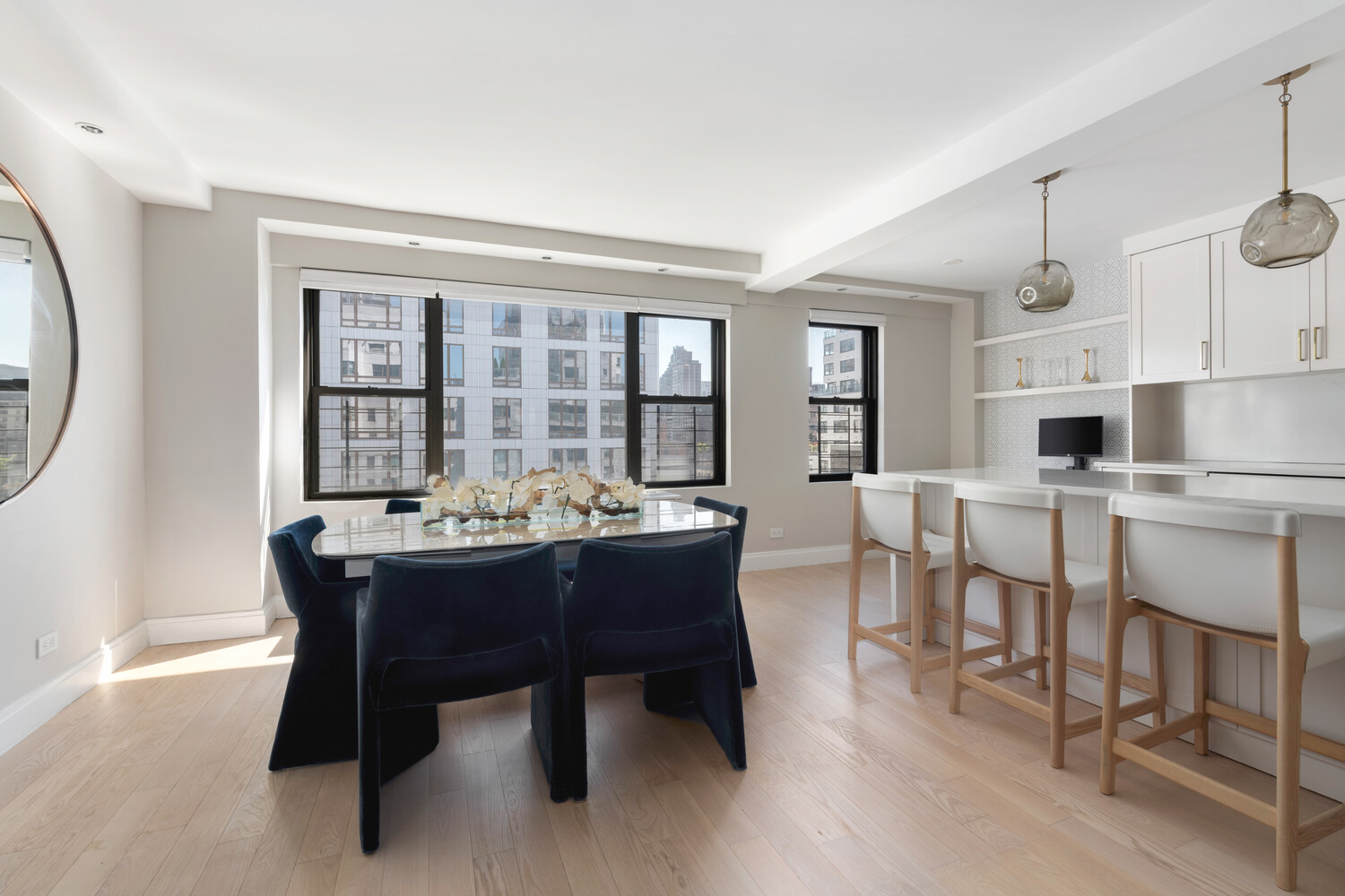 196 East 75th Street, Unit 16E Manhattan, NY 10021 - Photo 3 of 13 a dining room with furniture and window
