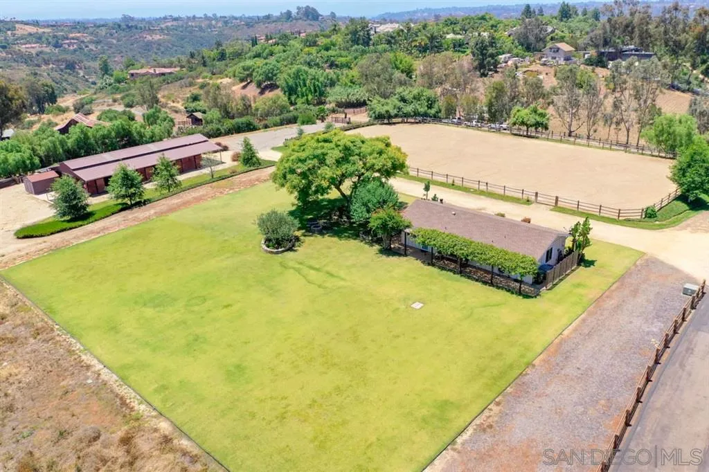Encinitas, CA 92024 - Photo 7 of 12 a view of a swimming pool with a garden and mountain view