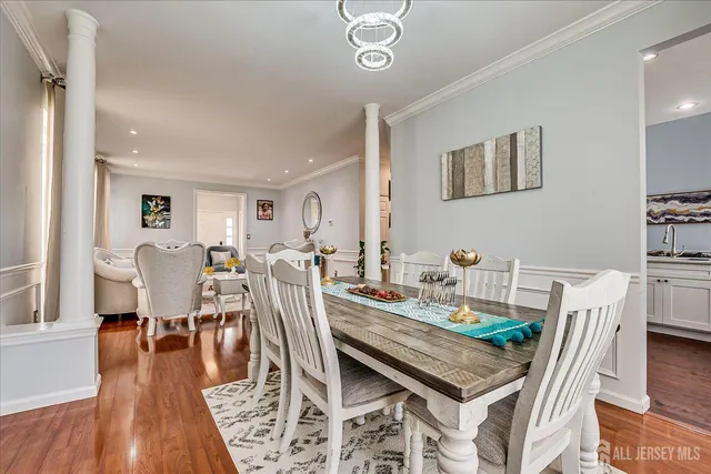 a bathroom with a tub sink and window