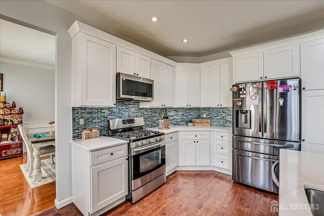 a bedroom with a bed and a cabinets